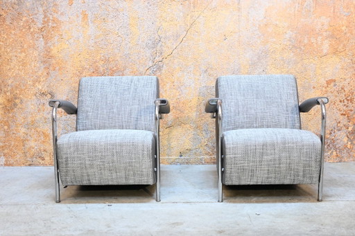 Fauteuil design Leolux Scylla en combinaison cuir couleur taupe + tissu
