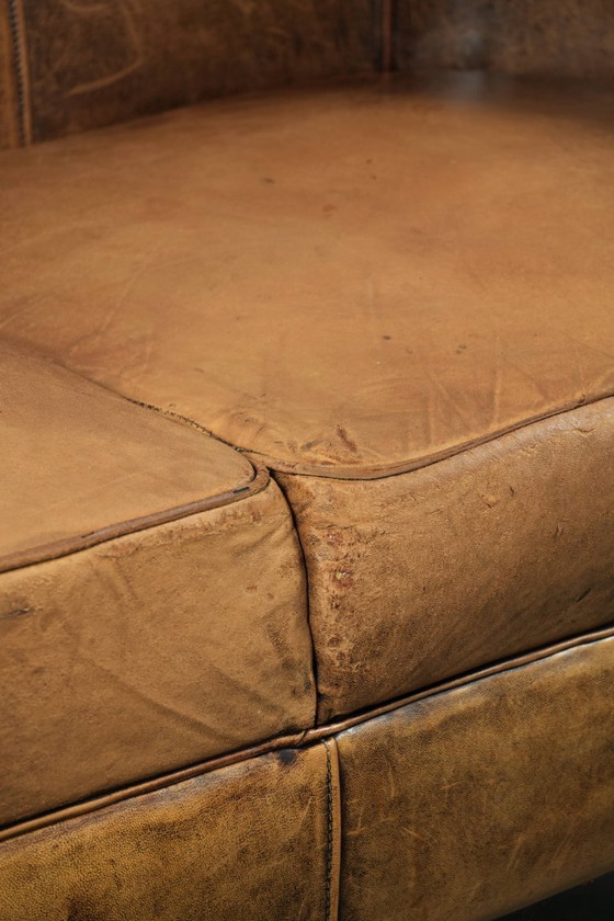 Image 1 of Karaktervolle schapenleren 2 zits bank met een mooie vintage look