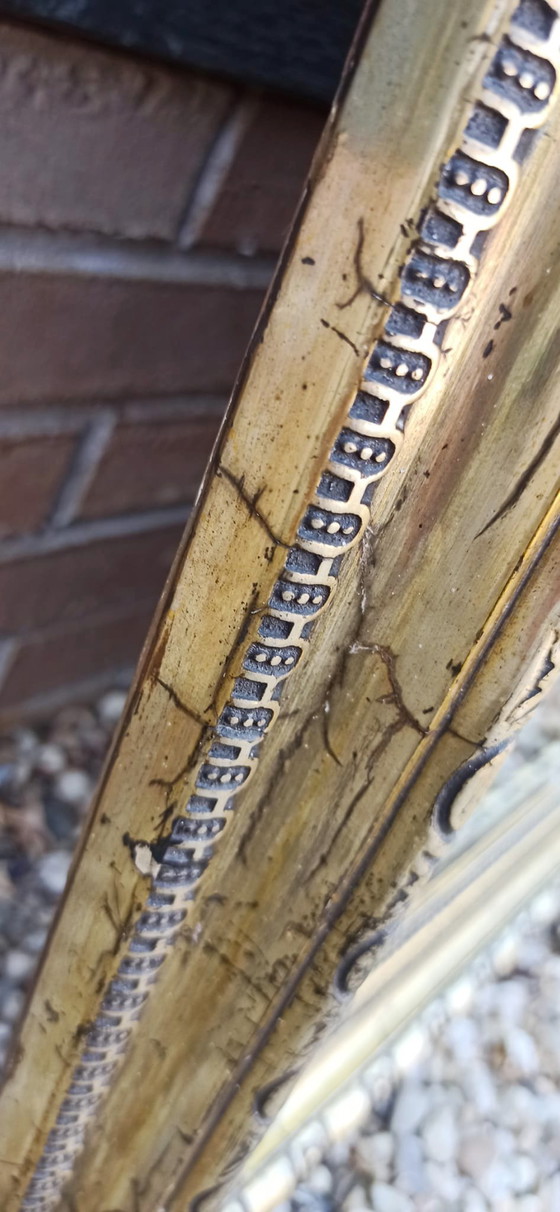 Image 1 of Grand miroir ancien à cadre doré et couronne