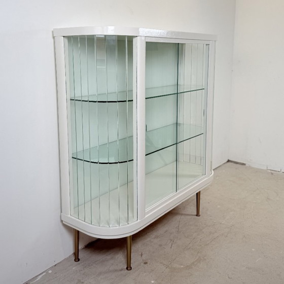 Image 1 of White vintage slatted display case on gold legs