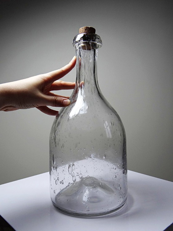 Image 1 of Large antique bottle in blown glass with bubbles, early 20th century, 1900-1920