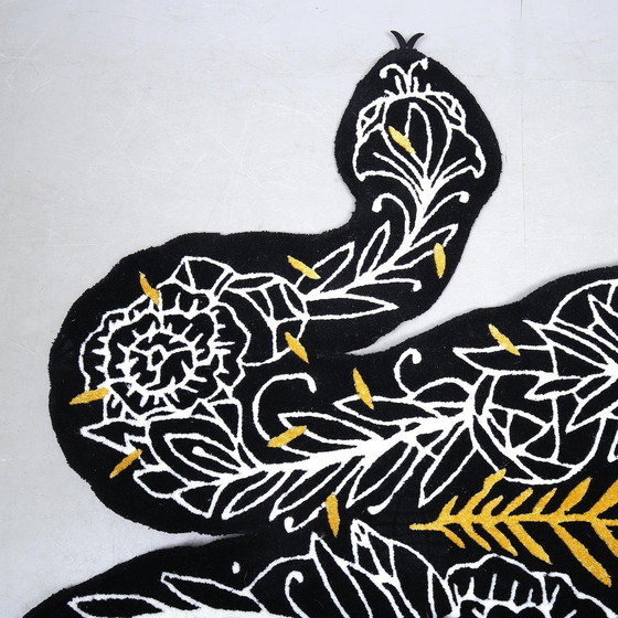 Image 1 of Evento artistico Ikea x tappeto a forma di serpente Supakitch