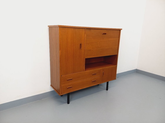 Image 1 of Vintage Scandinavisch modernistisch secretair bureau/boekenkast van teakhout en zwart metaal uit de jaren 50/60.