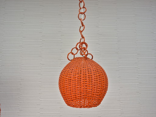 Orange rattan pendant lamp. Vintage wicker lamp with chain.