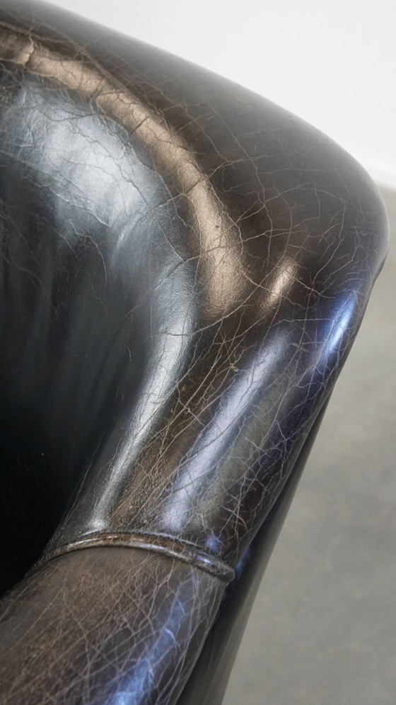 Image 1 of Zwarte generfde rundleren armchair/ fauteuil 