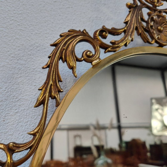 Image 1 of Vintage Goudkleurige Ovale spiegel kuifspiegel schouwspiegel. Koper 