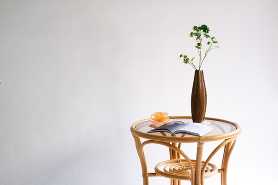 Image 1 of Elegant, round bamboo table with glass top
