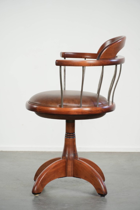 Image 1 of Draaibare Schuitema stoel/ bijzetstoel/ bureaustoel met een cognac kleurige rundleren zitting