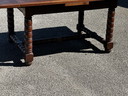 Solid oak extendable table, turned legs, 19th century