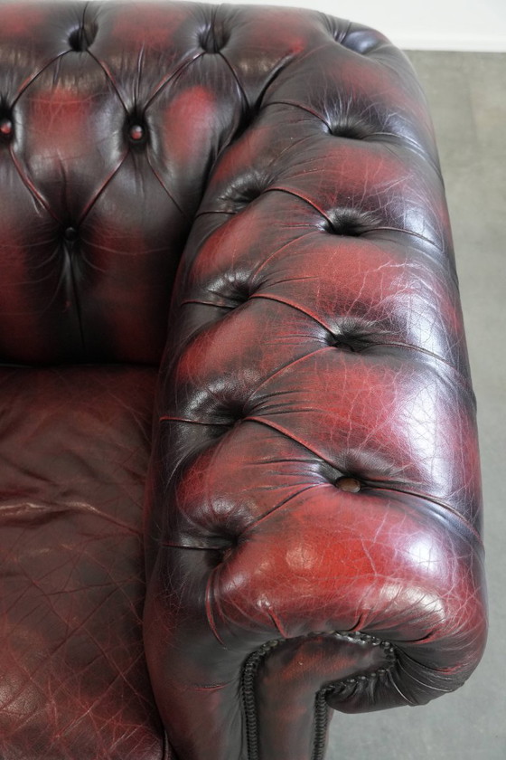 Image 1 of Englischer Chesterfield-Ledersessel auf Rollen, verziert mit Ziernieten