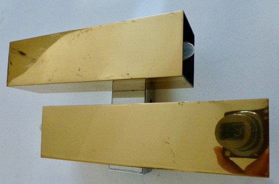Image 1 of A brass wall lamp, in a minimalist, geometric style, from the middle of the last century.