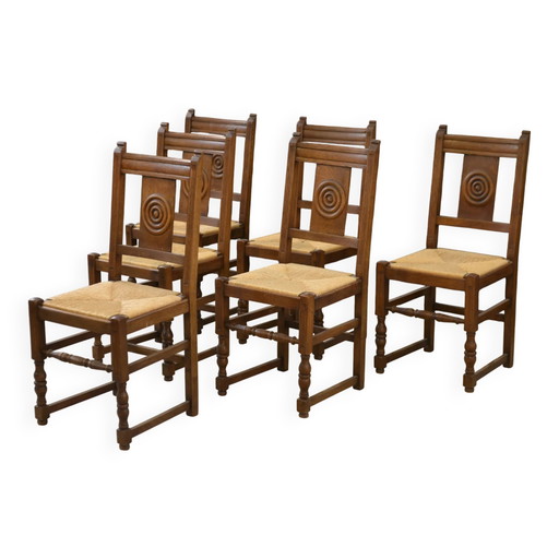 Set van 6 brutalistische eikenhouten stoelen uit de jaren 50.