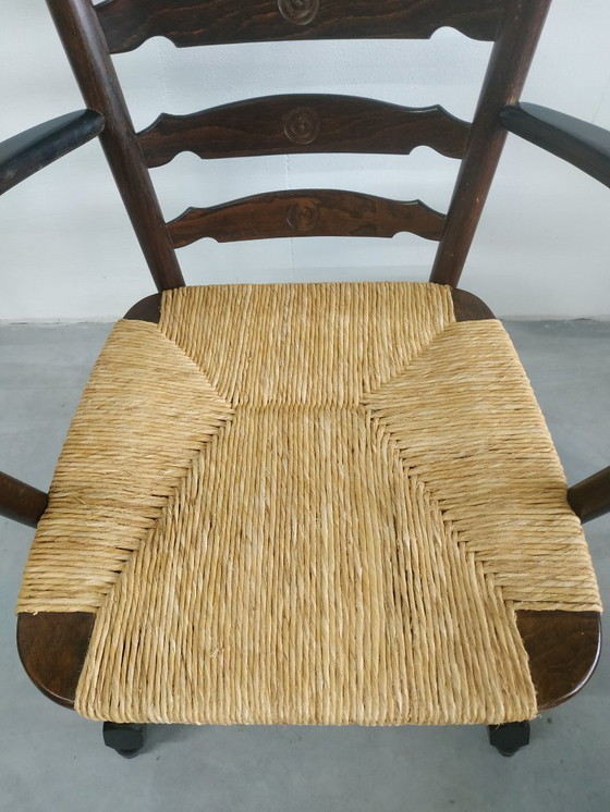 Image 1 of Poltrona da camino in legno vintage con seduta in vimini