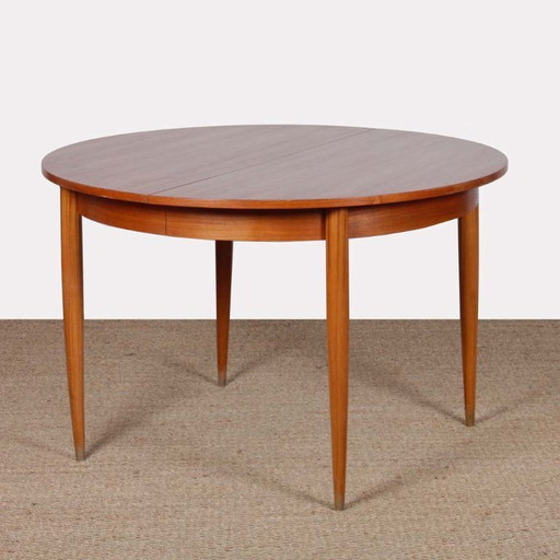 Round, extendable wooden dining table, 1960