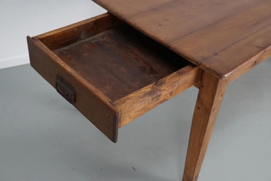 Image 1 of Early 20th-century French rustic country dining table made of fruitwood