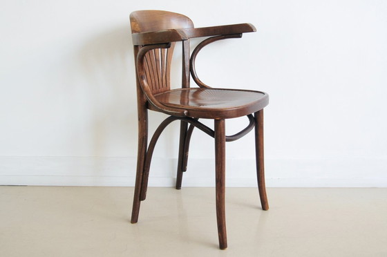 Image 1 of brown wooden bistro chair