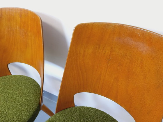 Image 1 of Set van 4 vintage Mondor stoelen van Baumann in hout en bouclé stof uit de jaren 60