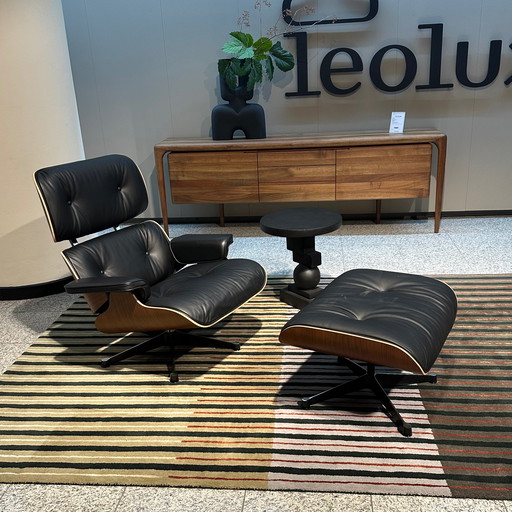 Sillón lounge Vitra Relax con reposapiés