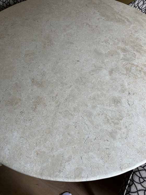 Image 1 of Round travertine dining table