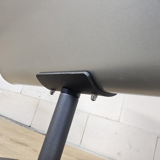 Image 1 of Modern curved metal minimalist side table with magazine rack / newspaper rack / magazine rack