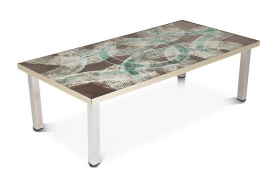 Image 1 of Coffee table with ceramic and chrome-plated top. Circa 1970.