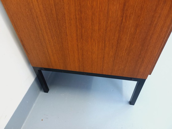 Image 1 of Vintage modernist sideboard by ARP Minvielle, designed by Guariche Mortier Motte, in teak and black metal, from the 1960s