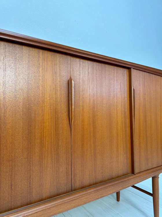 Image 1 of Dänisches Teak-Highboard aus den 1960er Jahren von Axel Christensen für ACO Møbler – Mid-Century-Schrank mit Schiebetüren