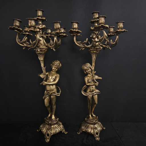 Large antique angel candlesticks