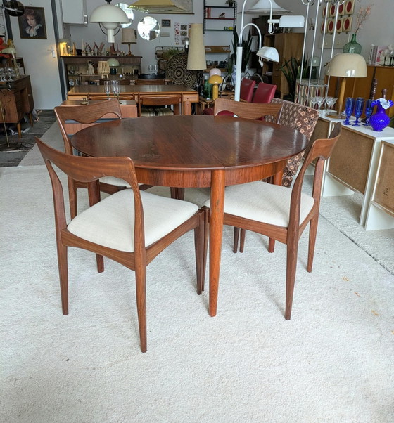 Vintage rosewood round extendable dining table (photo 7 of 11)