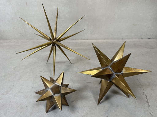 3x geometric figures in brass
