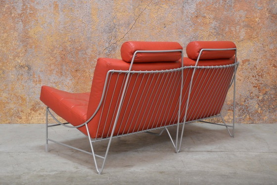 Image 1 of Red leather Leolux Volare design two-seater sofa
