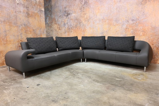 Canapé d'angle Leolux Vol de Reve en cuir gris retapissé
