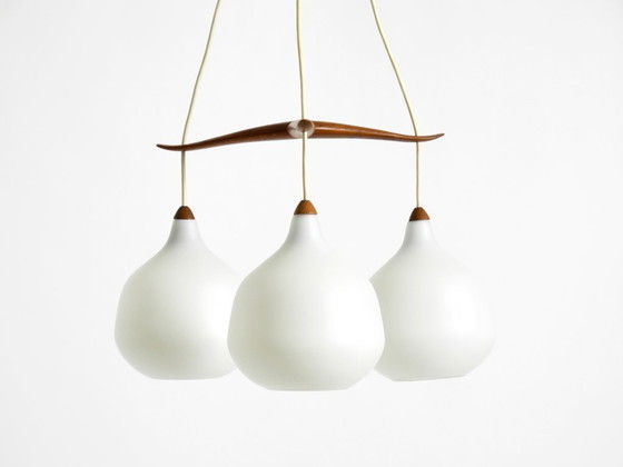 Image 1 of Beautiful pendant lamp with three opal glass shades and a teak frame by Uno & Östen Kristiansson for Luxus Vittsjö, Sweden 1957