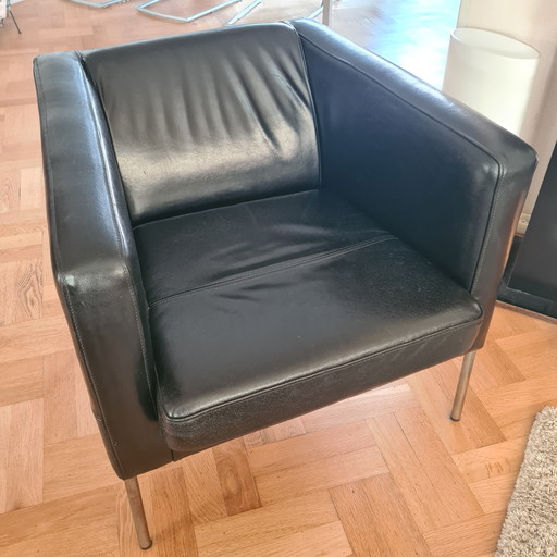 2 sillones de cuero negro