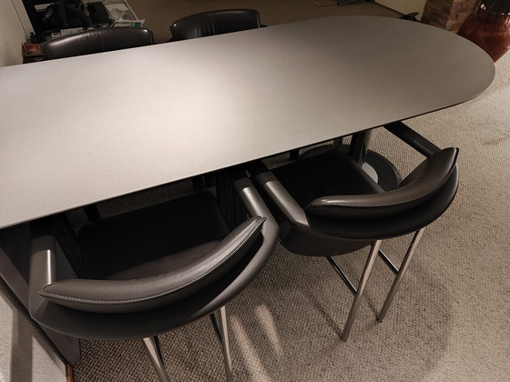 Image 1 of Dining room table with 4 leather chairs