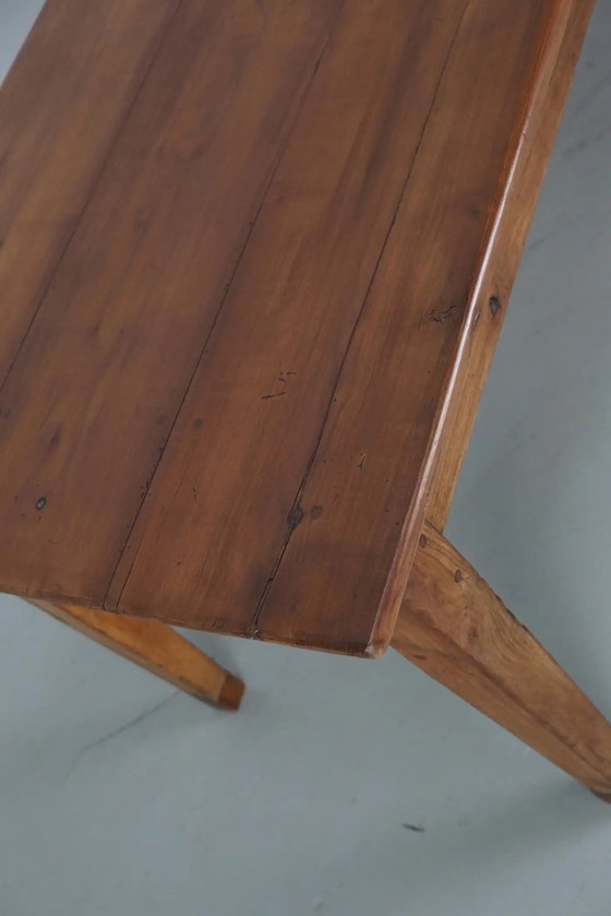Image 1 of Early 20th-century French rustic country dining table made of fruitwood