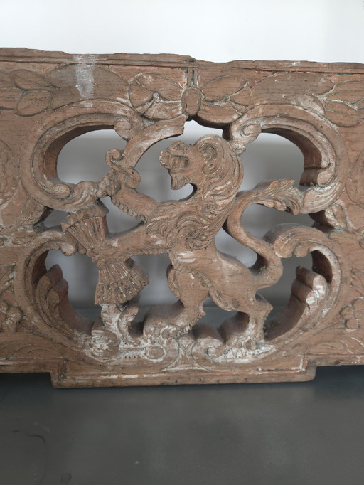 Rear of carriage. Carved wood