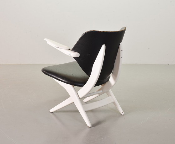 Image 1 of Louis van Teeffelen Dutch Design Pelican Arm Chair for Webe in Solid White Painted Teakwood and Black Leatherette. 
