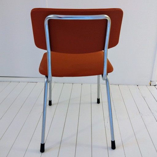 Gispen 1231 chair, new upholstery in coral red skai.
