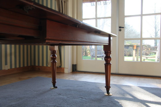 Image 1 of Victorian mahogany folding dining table by Eichholtz
