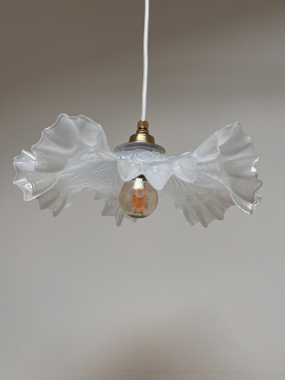 Image 1 of Atmospheric vintage pendant light featuring a distinctive glass shade, likely of French origin