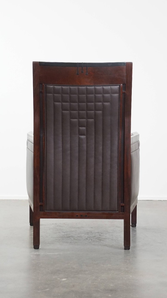 Image 1 of Art Deco Schuitema design fauteuil met donkerbruin leer uit de Decoforma serie met stiksels