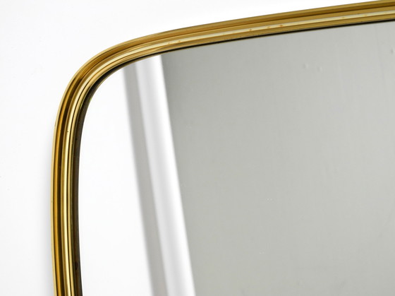 Image 1 of Magnifique miroir mural original du Mid Century Modern "Münchener Zierspiegel" avec cadre en laiton lourd