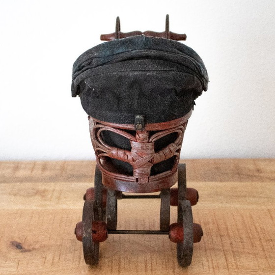Image 1 of Antique Victorian-style doll pram