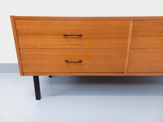 Image 1 of Small vintage modernist style sideboard in teak and metal from the 1960s