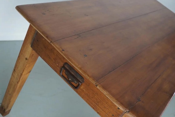Image 1 of Early 20th-century French rustic country dining table made of fruitwood