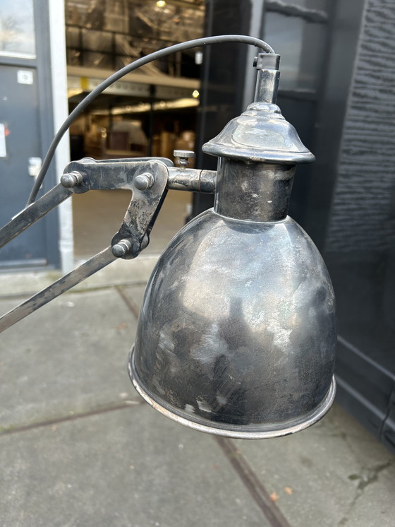Image 1 of Grote industriële vloerlamp – Flamant – verstelbare arm