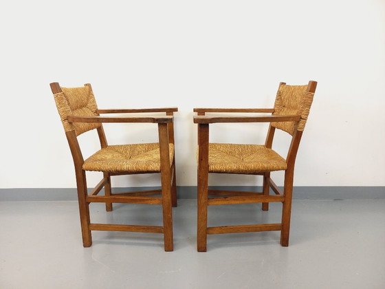 Image 1 of Suite van 2 vintage Brutalistische fauteuils in eiken en stro uit de jaren 60