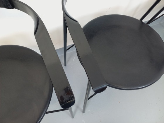 Image 1 of Set di 4 poltrone vintage di design italiano in metallo nero e similpelle nera degli anni '80