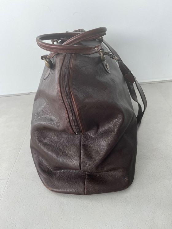 Image 1 of brown leather travel bag from Candy Corson leather atelier Amsterdam
